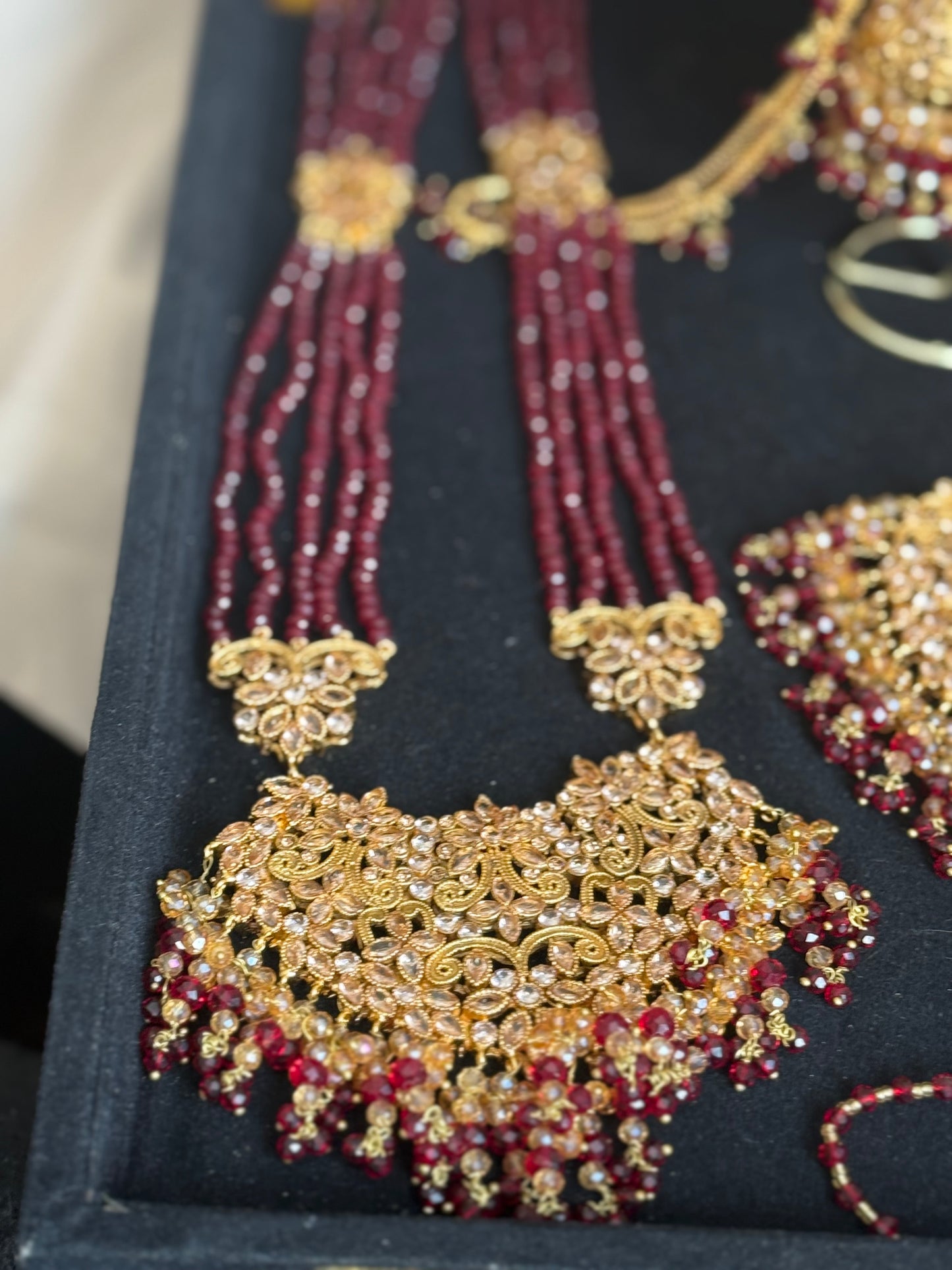 SANWAL - 6 Pieces set | includes: Mala, Necklace, Jhumar, Jhumke, Tikka & Nose ring | available in Maroon Gold colour