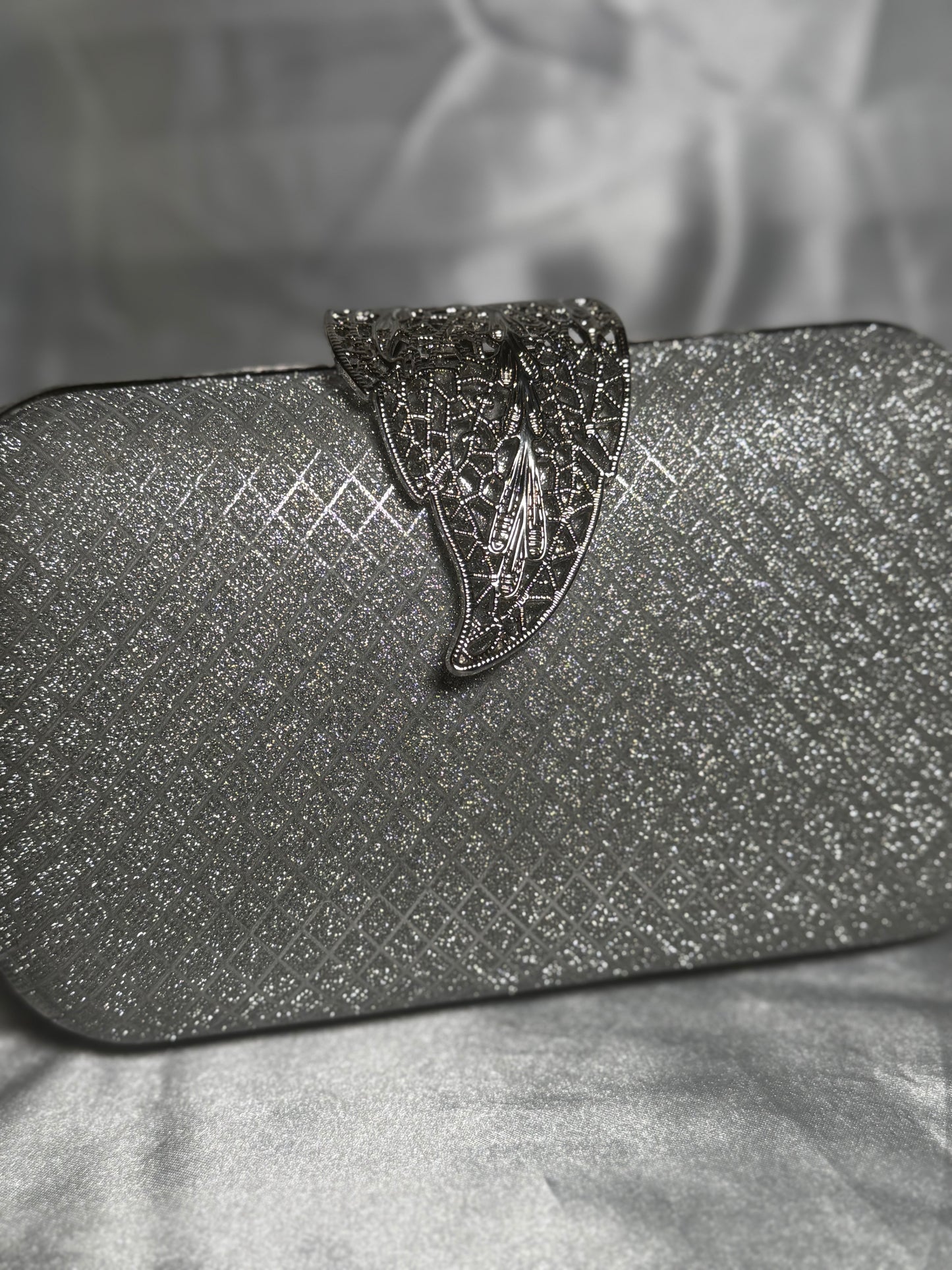 Aina - Silver Clutch bag