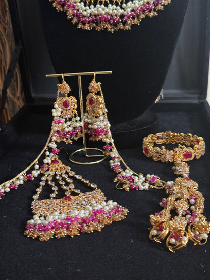 NIDA - Heavy bridal set | includes: necklace, choker, jhumar, earrings, tikka and a hand piece (HOT PINK)